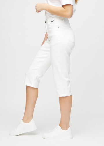 White regular capris seen from the side on a model.
