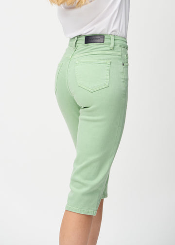 Light green regular capris seen from the back up close to show details.