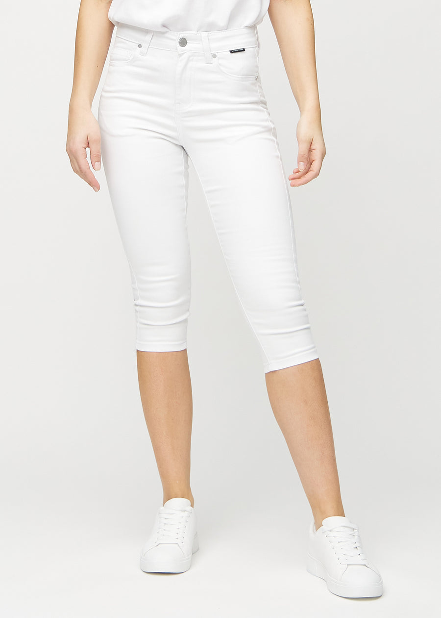 White skinny capris, model name Marguerites, which fit closely to the leg and end just below the knee, seen from the front.