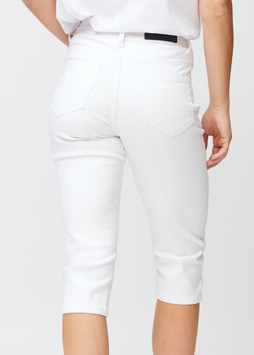 Close-up of the white slim capris from the back, so details and pockets can be seen clearly.