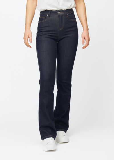 Deep dark blue denim jeans for women in the color Midnights with a bootcut fit that is fitted over the hips and thighs and has a slight flare at the ankles, seen from the front.