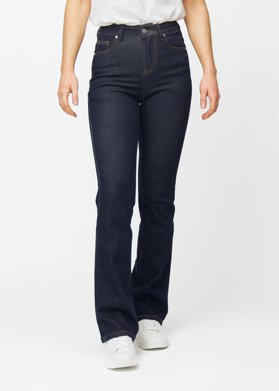 Deep dark blue denim jeans for women in the color Midnights with a bootcut fit that is fitted over the hips and thighs and has a slight flare at the ankles, seen from the front.