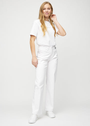 Full image of a model in white loose jeans.