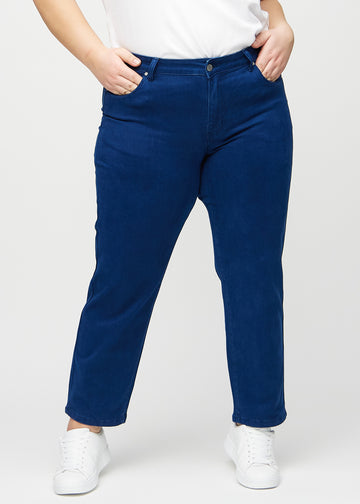 Regular jeans for women in dark blue, color Royals. Front view on a plus-size model, showing the classic straight-leg fit.