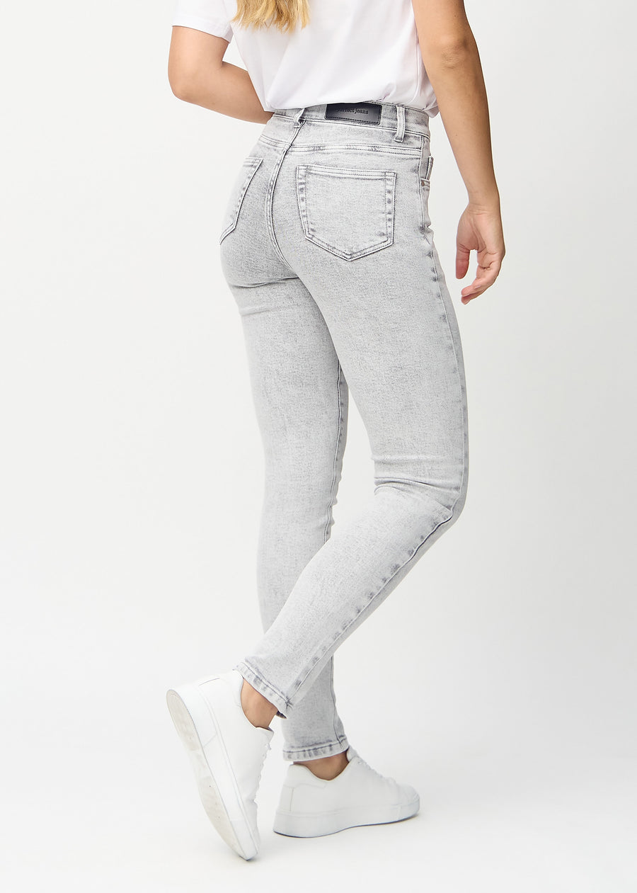 Light grey denim slim jeans seen from the back, so the entire product can be seen.