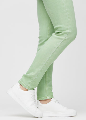 The ankles of a model, so you can see how tightly the jeans fit.