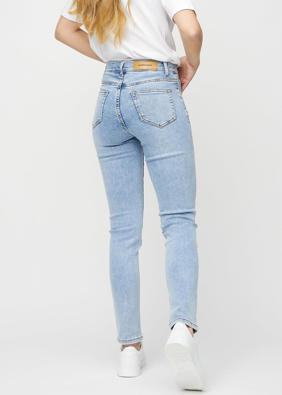 Slim jeans for women in light blue, color Waves. Back view on a model, showing the overall fit.